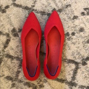 Red pointed-toe Rothy’s